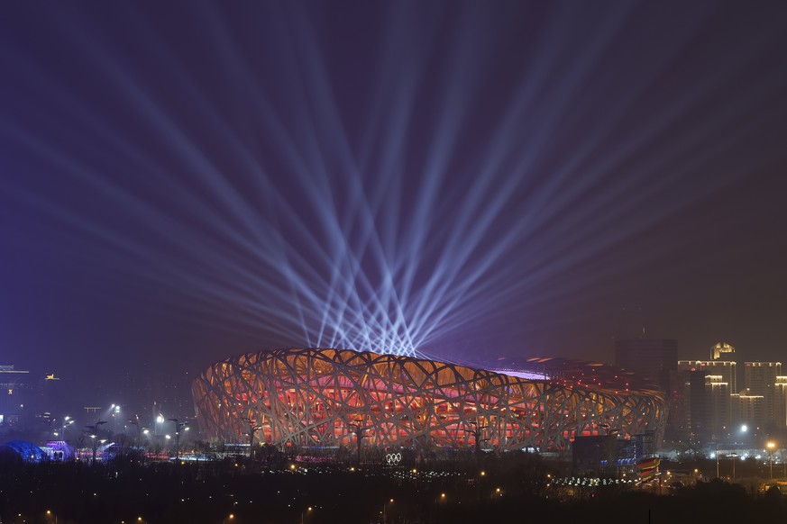 A light show during a rehearsal for the opening ceremony of the 2022 Winter Olympics to be held at the iconic Bird&#039;s Nest National Stadium in Beijing, China, Sunday, Jan. 30, 2022. (AP Photo/Wang ...