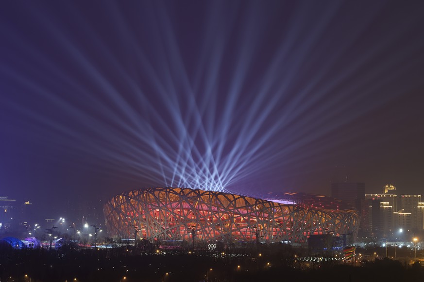 A light show during a rehearsal for the opening ceremony of the 2022 Winter Olympics to be held at the iconic Bird&#039;s Nest National Stadium in Beijing, China, Sunday, Jan. 30, 2022. (AP Photo/Wang ...