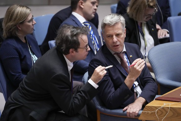 Thomas Zahneisen, Deputy Permanent Representative of Germany to the United Nations, right, attends a meeting of the United Nations Security Council to discuss the war in Ukraine, Thursday, Aug. 24, 20 ...