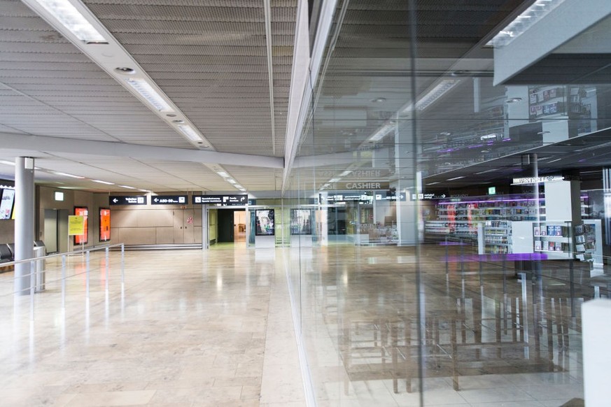 ZURICH, SWITZERLAND - APRIL 02: The Airport departure area and terminal stand devoid of passengers at nearly-empty Zurich Airport during the coronavirus crisis on April 2, 2020 in Zurich, Switzerland. ...