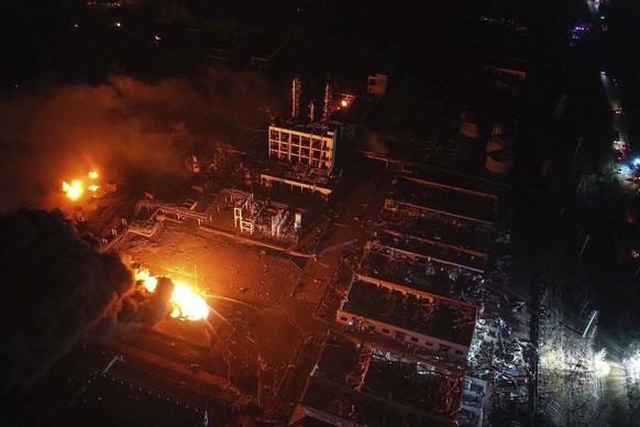 In this Thursday, March 21, 2019, aerial photo released by China&#039;s Xinhua News Agency, fires burn at the site of a factory explosion in a chemical industrial park in Xiangshui County of Yancheng  ...