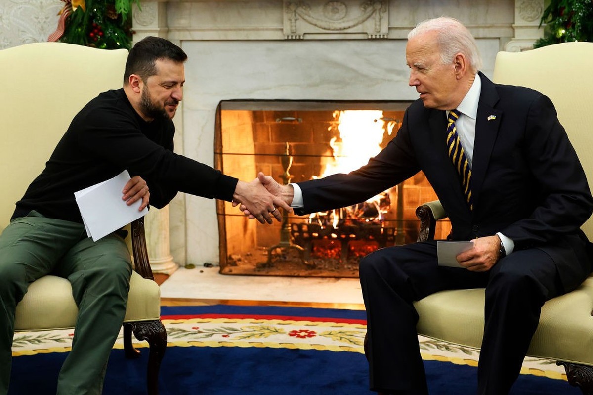 WASHINGTON, DC - DECEMBER 12: Ukrainian President Volodymyr Zelensky (L) and U.S. President Joe Biden shake hands while meeting in the Oval Office at the White House on December 12, 2023 in Washington ...