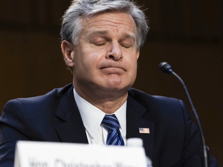FBI Director Christopher Wray testifies during a Senate Judiciary hearing about the Inspector General's report on the FBI's handling of the Larry Nassar investigation on Capitol Hill, Wednes ...