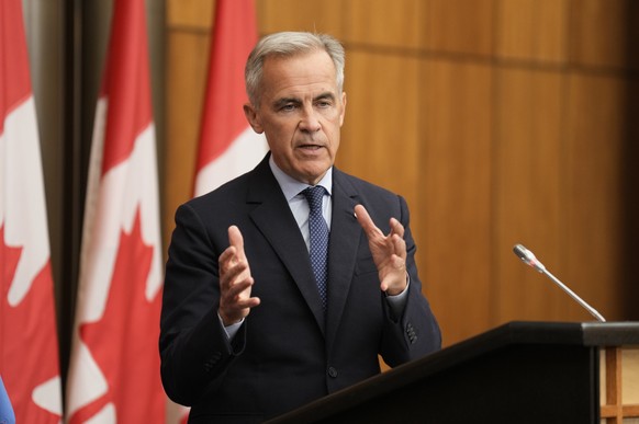 Canada Prime Minister Mark Carney speaks with media during a news conference in Ottawa, Ontario, Wednesday, July 30, 2025. (Adrian Wyld/The Canadian Press via AP)
Canada Carney