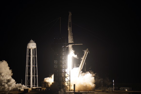 A SpaceX Falcon 9 rocket with the Crew Dragon capsule lifts off Wednesday, Nov. 10, 2021, at the Kennedy Space Center in Cape Canaveral, Fla. (AP Photo/Chris O&#039;Meara)