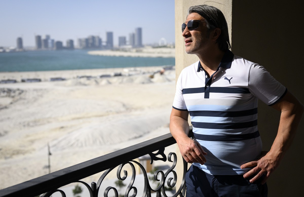 Switzerland's soccer national team head coach Murat Yakin looking at the view from a room of the hotel "Le Royal Meridien" during his visit of the hotel as they choose the Switzerland t ...