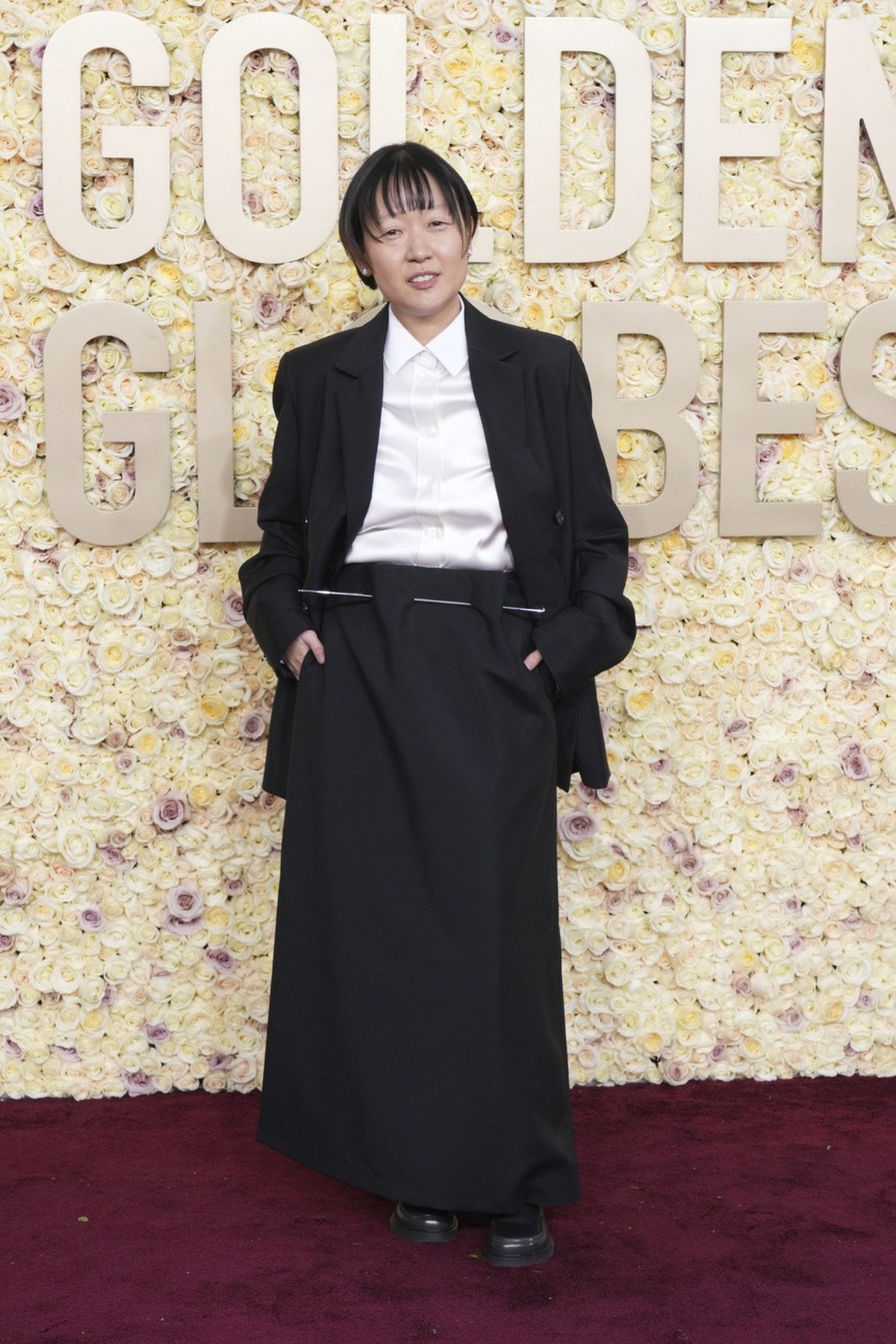 Celine Song arrives at the 81st Golden Globe Awards on Sunday, Jan. 7, 2024, at the Beverly Hilton in Beverly Hills, Calif. (Photo by Jordan Strauss/Invision/AP)