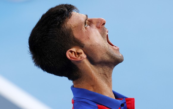 epa09382086 Novak Djokovic of Serbia reacts during the Men&#039;s singles Bronze medal match against Pablo Carreno Busta of Spain during the Tennis events of the Tokyo 2020 Olympic Games at the Ariake ...