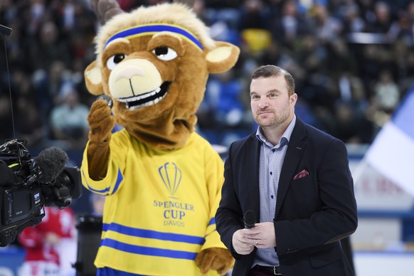 Oc president Marc Gianola and mascotte Hitsch are pictured during the opening ceremony prior the game between Team Suisse and Dinamo Riga at the 91th Spengler Cup ice hockey tournament in Davos, Switz ...