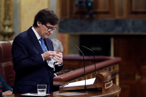 epa08782433 Spanish Health Minister, Salvador Illa at the Lower House where MPs are to debate on the State of Alarm, in Madrid, Spain, 29 September 2020. The Parliament is to vote a new extension of t ...