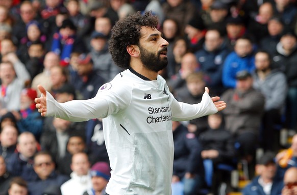 FILE - In this Saturday, March, 31, 2018 file photo, Liverpool&#039;s Mohamed Salah celebrates scoring his side&#039;s second goal of the game during their English Premier League soccer match against  ...