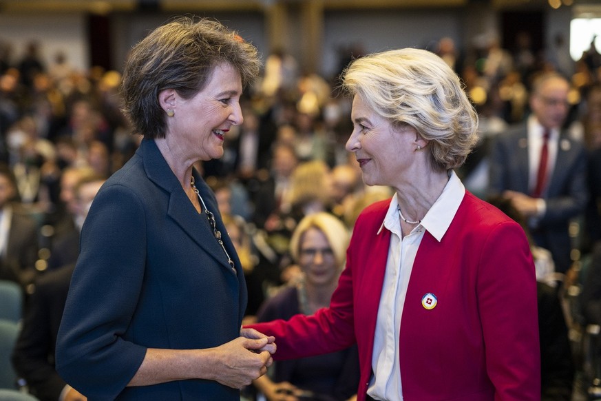 Swiss Federal Councillor Simonetta Sommaruga, Minister of Infrastructure, Transport, Environment and Energy, left, speaks with Ursula Von der Leyen, President of the European Commission, during the Uk ...