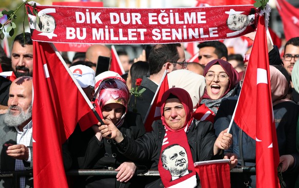 epa07055902 Pro-Turkish government demonstrators gather in front of the DITIB (Turkish-Islamic Union for Religious Affairs) Central Mosque in Cologne, Germany, 29 September 2018. Turkish President Rec ...