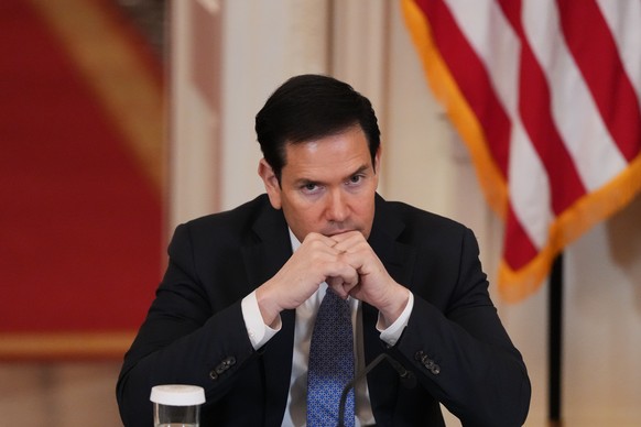 Secretary of State Marco Rubio listens during a roundtable discussion on college sports in the East Room of the White House, Friday, March 6, 2026, in Washington. (AP Photo/Julia Demaree Nikhinson)
Tr ...