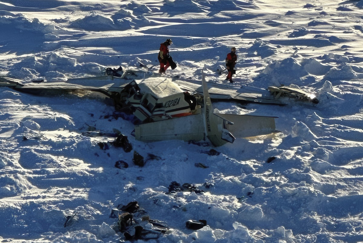 This photo provided by the U.S. Coast Guard on Friday, Feb. 7, 2025, shows a small commuter plane that crashed in western Alaska on a flight that was bound for the hub community of Nome. (U.S. Coast G ...