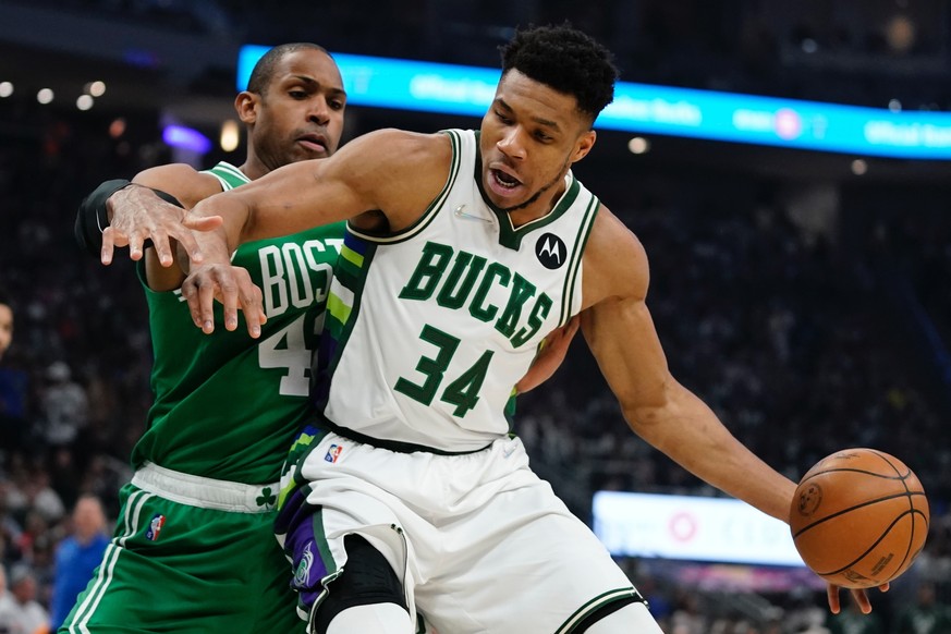 Milwaukee Bucks&#039; Giannis Antetokounmpo tries to get past Boston Celtics&#039; Al Horford during the first half of Game 3 of an NBA basketball Eastern Conference semifinals playoff series Saturday ...