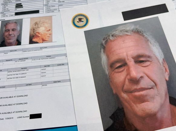 FILE - Documents that were included in the U.S. Department of Justice release of the Jeffrey Epstein files are photographed Friday, Jan. 2, 2026. (AP Photo/Jon Elswick, File)
Justice Department Jeffre ...