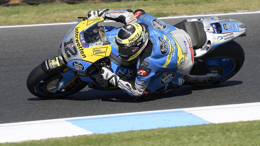 EG O,O Marc VDD rider Tom Luthi of Switzerland races through a corner during the Australian Motorcycle Grand Prix race at Phillip Island, Sunday, Oct. 28, 2018. (AP Photo/Andy Brownbill)