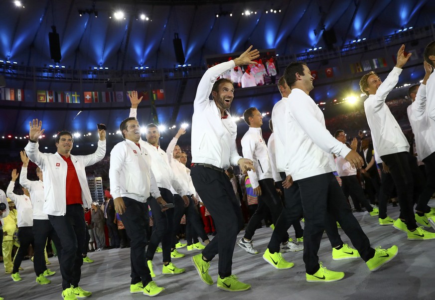 2016 Rio Olympics - Opening Ceremony - Maracana - Rio de Janeiro, Brazil - 05/08/2016. Switzerland arrive for the opening ceremony. REUTERS/Kai Pfaffenbach FOR EDITORIAL USE ONLY. NOT FOR SALE FOR MAR ...