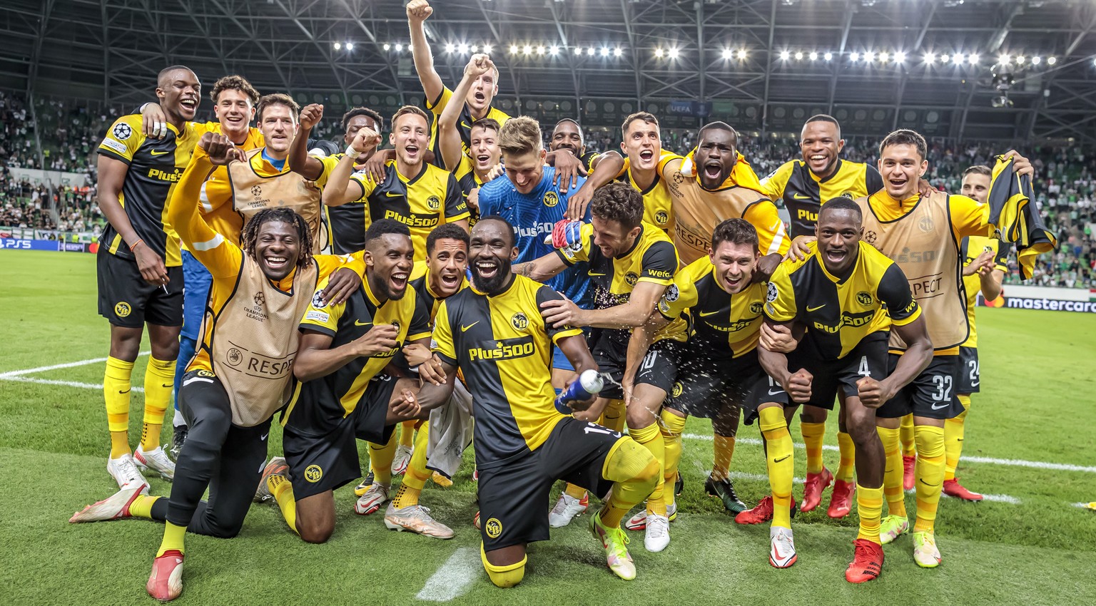 Young Boys&#039; player celebrate their victory after the UEFA Champions League Play-off second leg soccer match between Ferencvaros TC and BSC Young Boys of Switzerland, on Tuesday, August 24, 2021 a ...