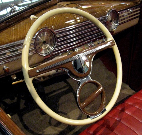 Interior detail of a beautiful 1941 Chevrolet, seen at the Antique Automobile Club of America (AACA) Museum in Hershey, Pennsylvania. The steering wheel is a &quot;spinner steering wheel,&quot; which  ...