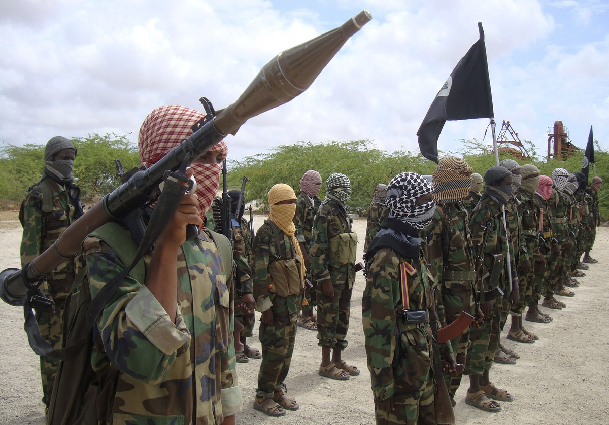 FILE - Al-Shabaab fighters display weapons as they conduct military exercises in northern Mogadishu, Somalia, on Oct. 21, 2010. The United Nations Security Council on Thursday Nov. 9, 2023 suspended f ...