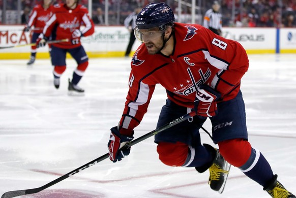 FILE - In this Feb. 4, 2018, file photo, Washington Capitals left wing Alex Ovechkin (8), from Russia, skates in the second period of an NHL hockey game against the Vegas Golden Knights, in Washington ...