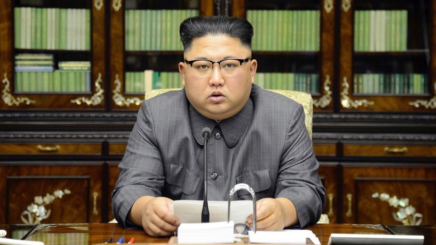 In this Thursday, Sept. 21, 2017, photo distributed on Friday, Sept. 22, 2017, by the North Korean government, North Korean leader Kim Jong Un delivers a statement in response to U.S. President Donald ...