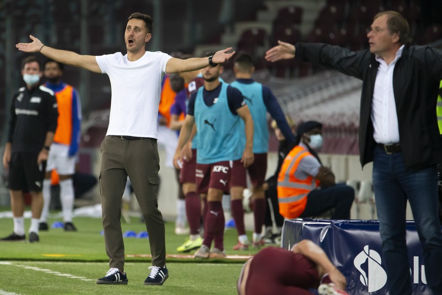Ilija Borenovic, left, coach of FC Lausanne-Sport,and Alain Geiger, right, coach of Servette FC, react, during the Super League soccer match of Swiss Championship between Servette FC and FC Lausanne-S ...