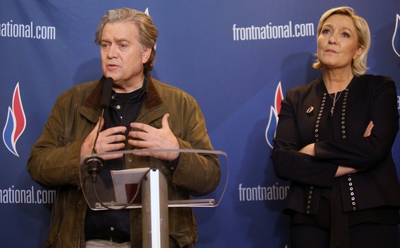 epa06594363 Former senior advisor to President Donald Trump, Stephen K. Bannon (L) and French member of the parliament and far-right political party National Front (Front National FN) president Marine ...