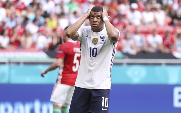 France&#039;s Kylian Mbappe reacts during the Euro 2020 soccer championship group F match between Hungary and France, at the Ferenc Puskas stadium, in Budapest, Saturday, June 19, 2021. (Alex Pantling ...