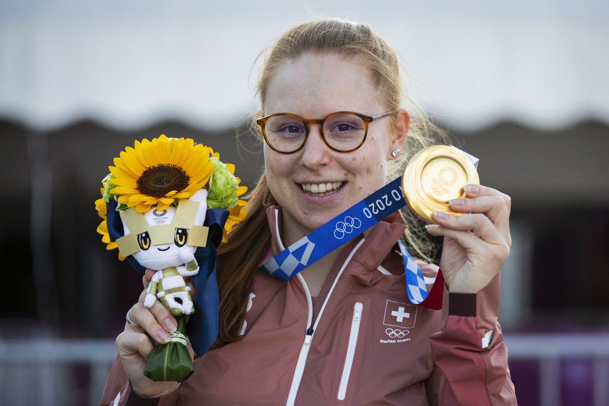 Nina Christen of Switzerland poses with the gold medal after the women's shooting 50m Rifle 3 Positions Finals at the 2020 Tokyo Summer Olympics in Tokyo, Japan, on Saturday, July 31, 2021. (KEYS ...