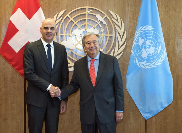 In this photo provided by the United Nations, Switzerland&#039;s Federal President Alain Berset, left, shakes hands with United Nations Secretary General Antonio Guterres at United nations Headquarter ...