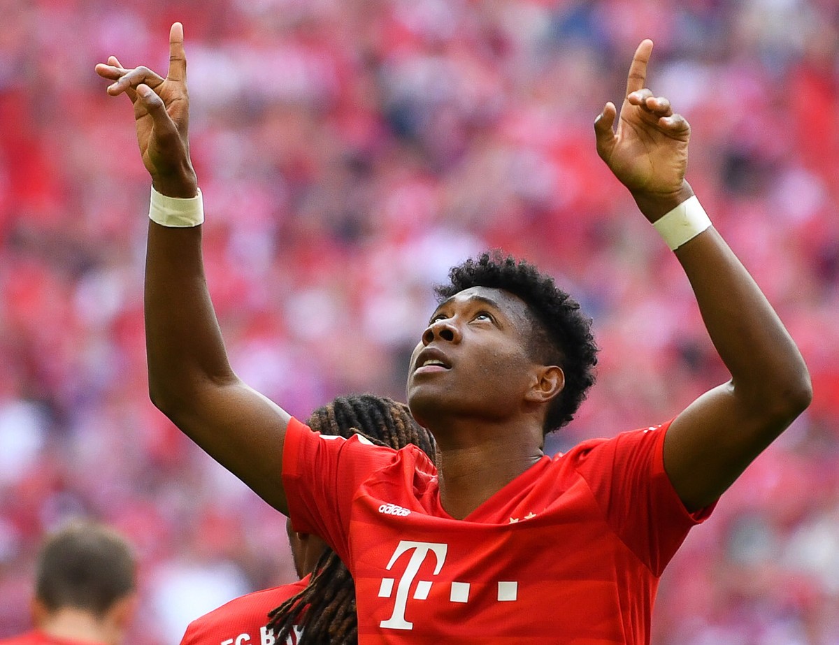 epa07581287 Bayern's David Alaba celebrates after scoring the 2-1 lead during the German Bundesliga soccer match between FC Bayern Munich and Eintracht Frankfurt in Munich, Germany, 18 May 2019.  ...