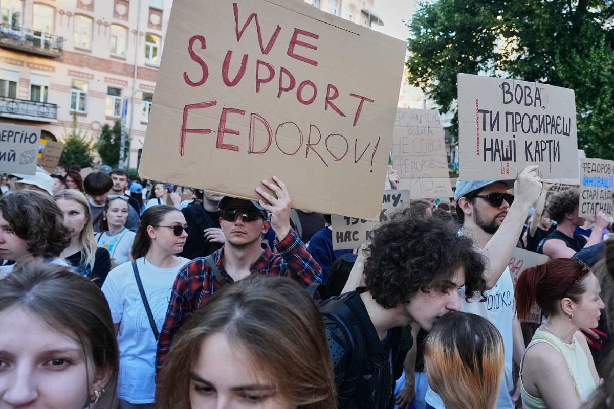 Activists shout slogans during a rally to denounce President Volodymyr Zelenskyy's decision to dismiss Defense Minister Mykhailo Fedorov after six months in the post, Friday, July 17, 2026, Kyiv, ...