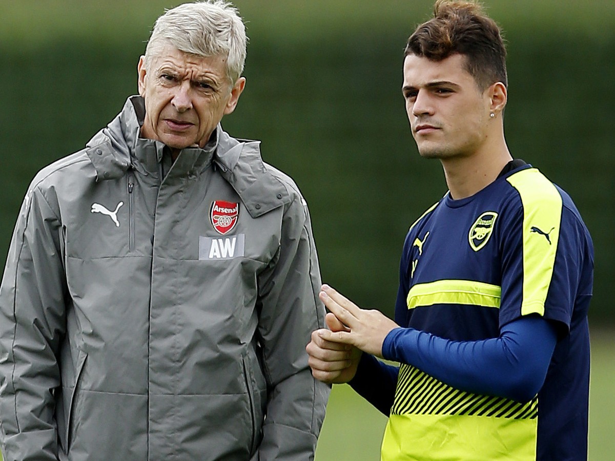 Britain Soccer Football - Arsenal Training - Arsenal Training Ground - 27/9/16
Arsenal manager Arsene Wenger and Granit Xhaka during training
Action Images via Reuters / Andrew Couldridge
Livepic
 ...