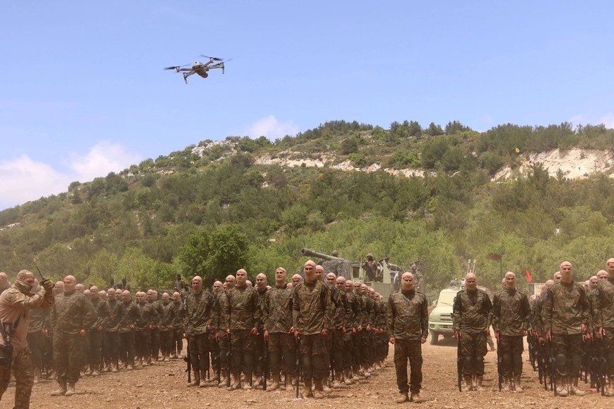 Lebanon: Hezbollah stages military drill near the border with Israel Hezbollah stages military drill in Aramta, South Lebanon, on May 21 2023. In occasion of the anniversary of Israeli withdrawal from ...