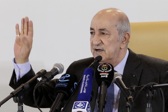 FILE - In this Friday, Dec. 13, 2019 file photo, newly elected Algerian President Abdelmadjid Tebboune gestures during a press conference in Algiers. Tebboune has been transferred to Germany for speci ...