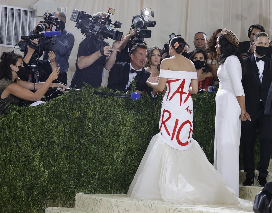 epaselect epa09466819 Alexandria Ocasio-Cortez (L) and Aurora James (R) pose on the red carpet for the 2021 Met Gala, the annual benefit for the Metropolitan Museum of Art's Costume Institute, in ...