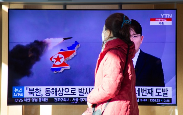 epa09690378 A woman watchs the news at a station in Seoul, South Korea, 17 January 2022. According to South Korea&#039;s Joint Chiefs of Staff (JCS), North Korea fired two unidentified ballistic missi ...