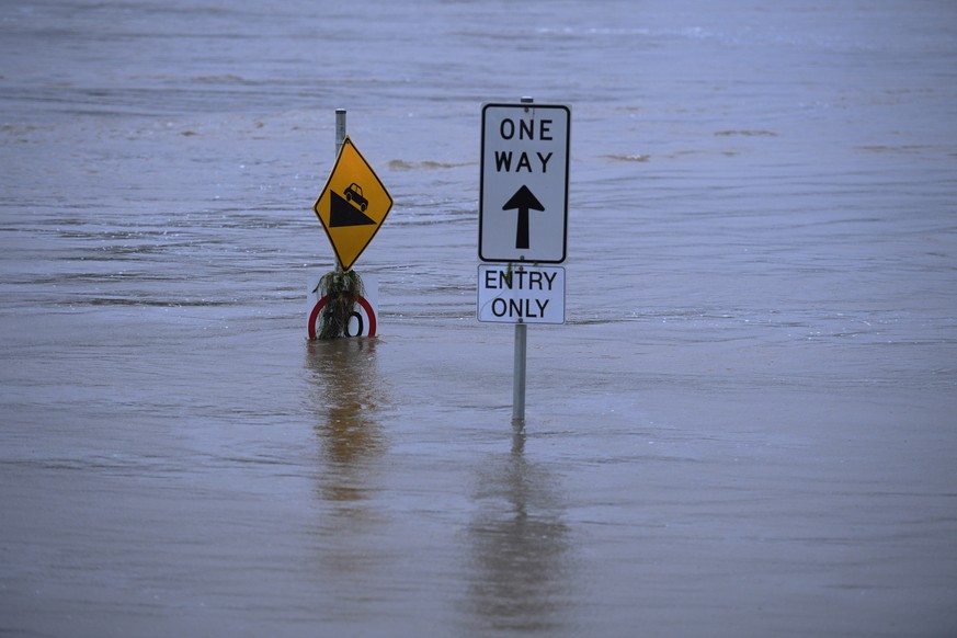 epa09088938 The flooded Nepean River at Trench Reserve at Penrith in Sydney, Australia, 22 March 2021. Thousands of residents are fleeing their homes, schools are shut, and scores of people have been ...