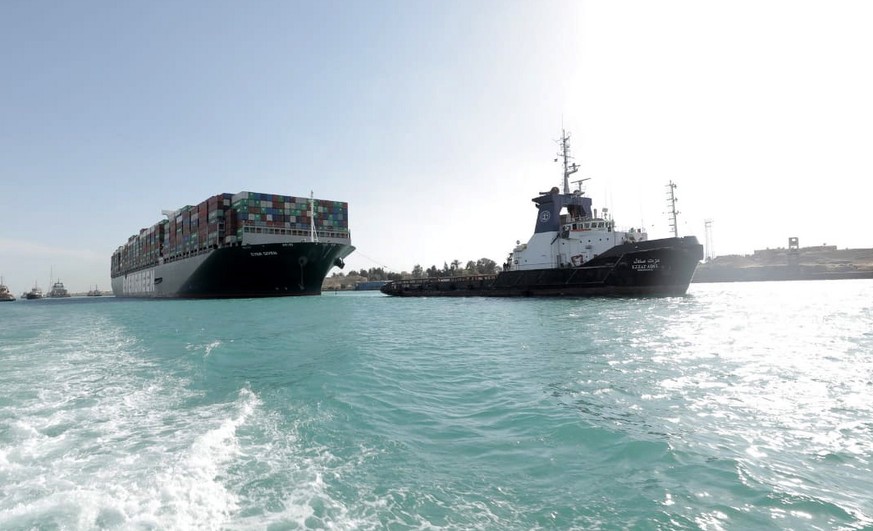 epa09105476 A handout photograph made available by the Suez Canal Authority shows the Ever Given container ship after it was refloated in the Suez Canal, Egypt, 29 March 2021. The head of the Suez Can ...