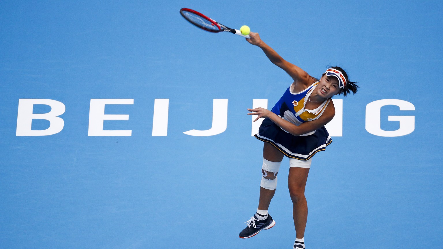 FILE - Peng Shuai of China serves against Monica Niculescu of Romania during their women&#039;s singles match of the China Open tennis tournament at the Diamond Court in Beijing, Wednesday, Oct. 4, 20 ...