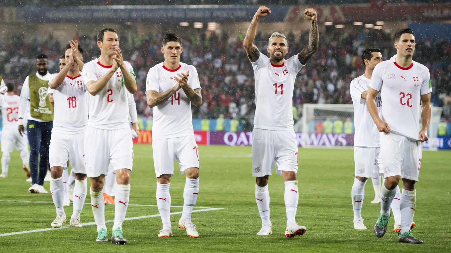 Switzerland's soccer players with Stephan Lichtsteiner, Steven Zuber, Valon Behrami, Fabian Schaer, celebrate the victory during the FIFA World Cup 2018 group E preliminary round soccer match between  ...