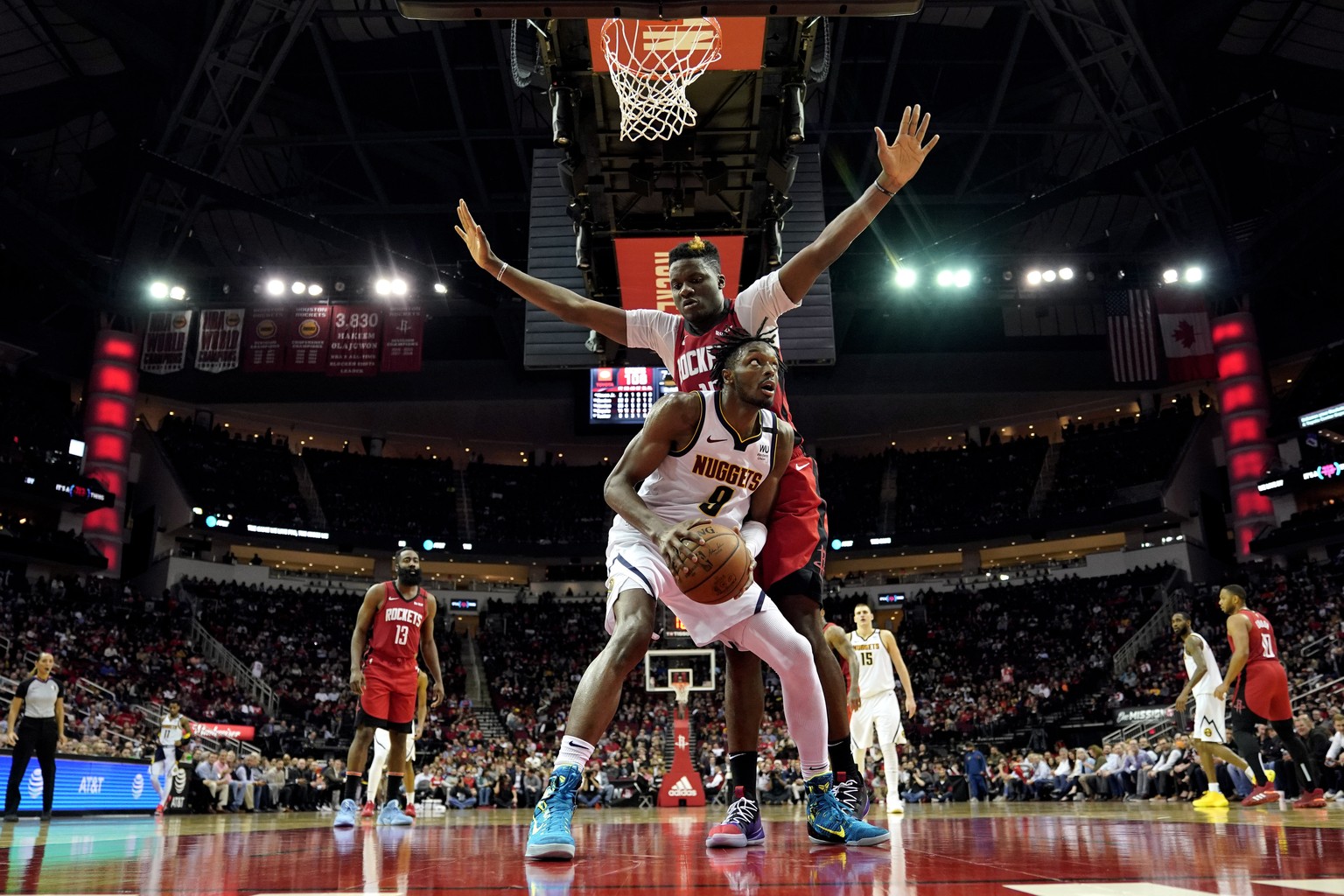 Denver Nuggets&#039; Jerami Grant (9) looks to shoot as Houston Rockets&#039; Clint Capela defends during the second half of an NBA basketball game Wednesday, Jan. 22, 2020, in Houston. The Rockets wo ...