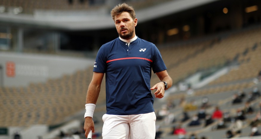 epa08701985 Stan Wawrinka of Switzerland in action against Andy Murray of Britain during their men?s first round match during the French Open tennis tournament at Roland Garros in Paris, France, 27 Se ...