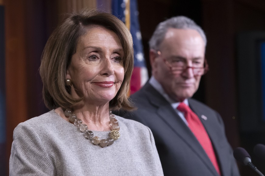 epa07319783 Democratic House Speaker Nancy Pelosi (L) and Democratic Senate Minority Leader Chuck Schumer (R) speak to the news media, after US President Donald J. Trump agreed to end the longest part ...