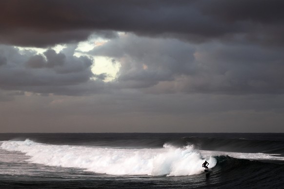 epaselect epa11517825 An athlete in action during the practice run ahead of Women round 3 of the Surfing competitions in the Paris 2024 Olympic Games, in Teahupo&#039;o, Tahiti, 01 August 2024. EPA/FA ...