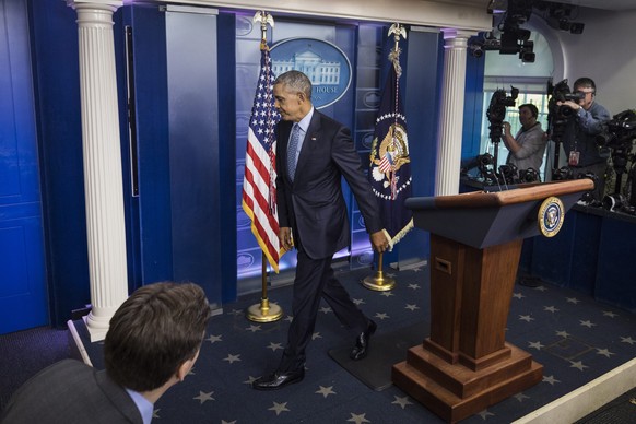 epa05728673 US President Barack Obama departs the Brady Press Briefing Room after his last press conference as president at the White House in Washington, DC, USA, 18 January 2017. Obama spoke about t ...