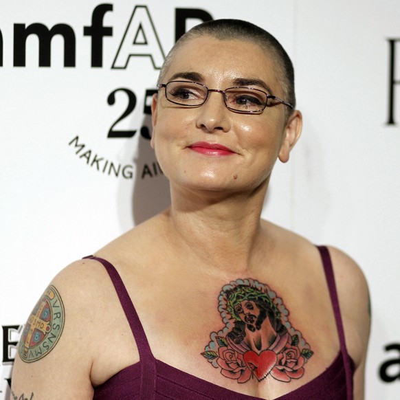 FILE - In this Oct. 27, 2011 file photo, Irish musician Sinead O&#039;Connor arrives at amfAR&#039;s Inspiration Gala in Los Angeles. O&#039;Connor is working on a memoir that will come out in March 2 ...